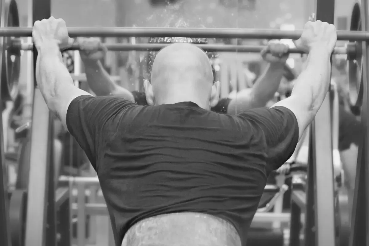 Strength training at the squat rack